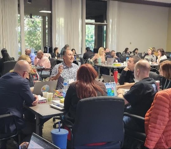 LFM participants working in groups.